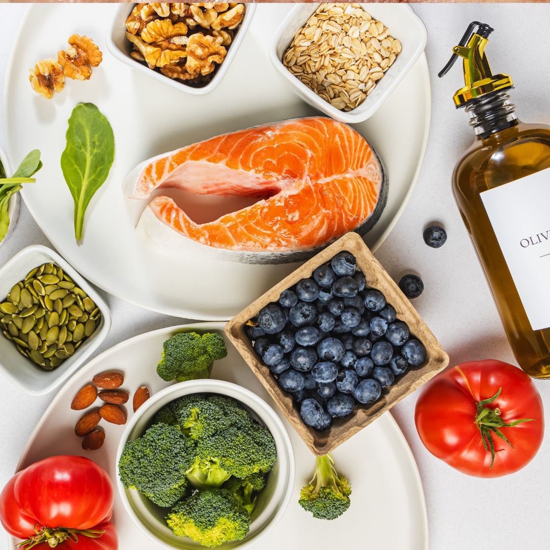 Colourful berries, vegetables, nuts, olive oil and green tea as part of a skin-supportive diet.